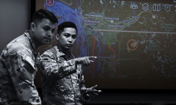Decorative image of Soldiers in front of a map