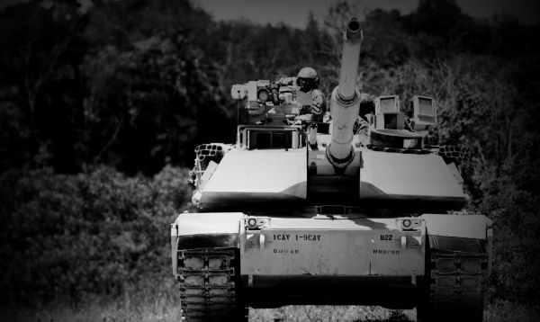 Decorative image of front view of armored vehicle