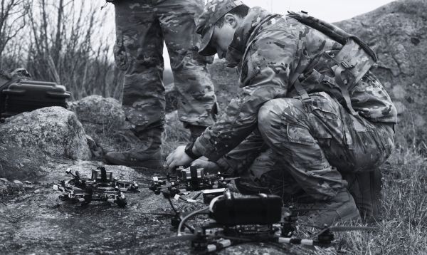 Decorative image of soldier walking on a test range